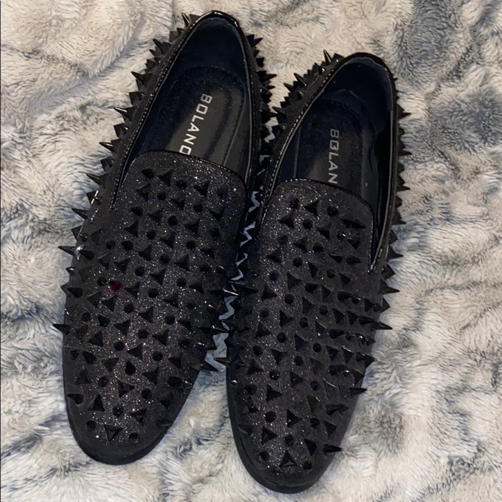 Men’s black spike dress shoes
